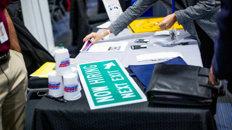 Initial jobless claims down 9,000 to 214,000