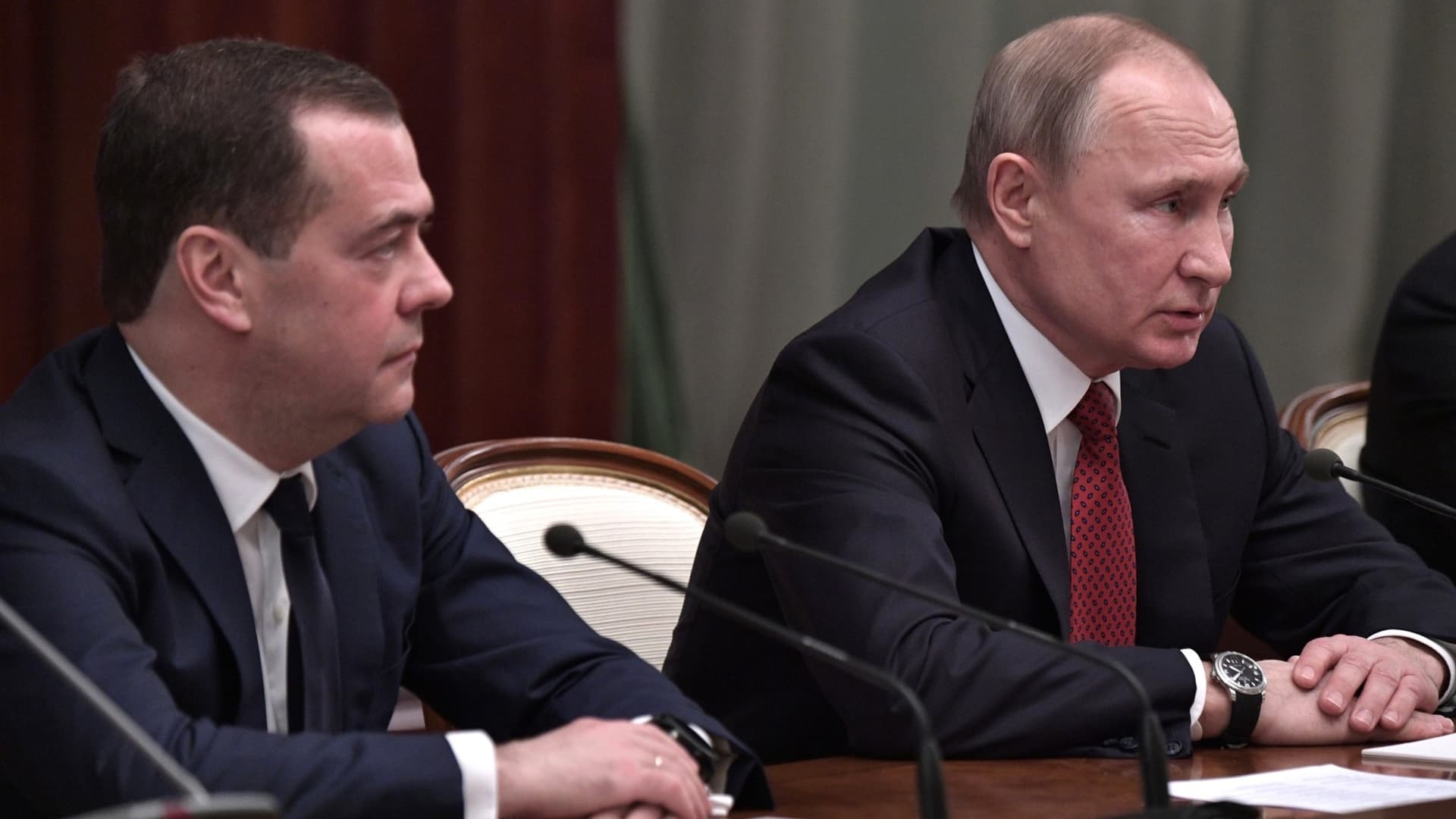 Russian President Vladimir Putin (R) and Russian Prime Minister Dmitriy Medvedev are seen at a meeting with the government, following Putin's address to the Federal Assembly, in Moscow, Russia on January 15, 2020.