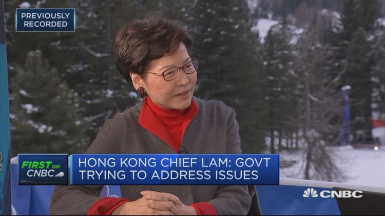 Hong Kong leader says police handling protests in a 'restrained way'