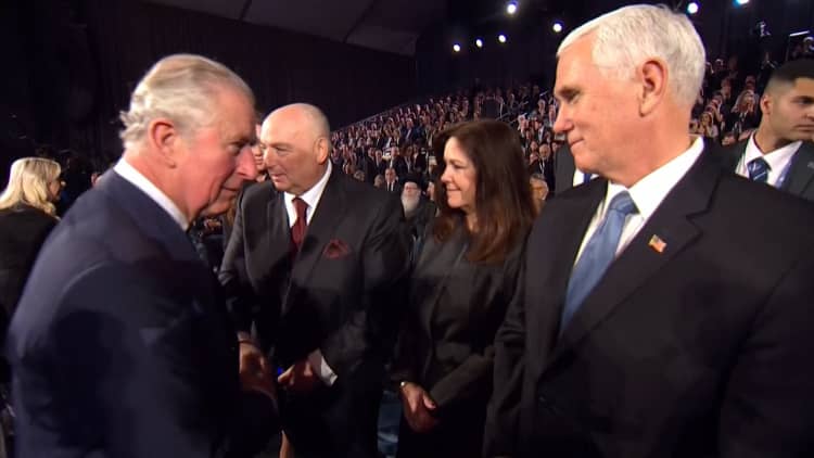 Mike Pence caught on hot mic moments before an apparent snub from Prince Charles