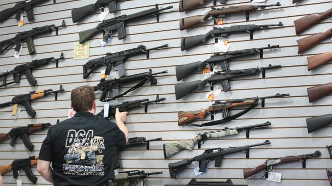 Guns are displayed inside a store on June 17, 2016 in Lake Barrington, Illinois.