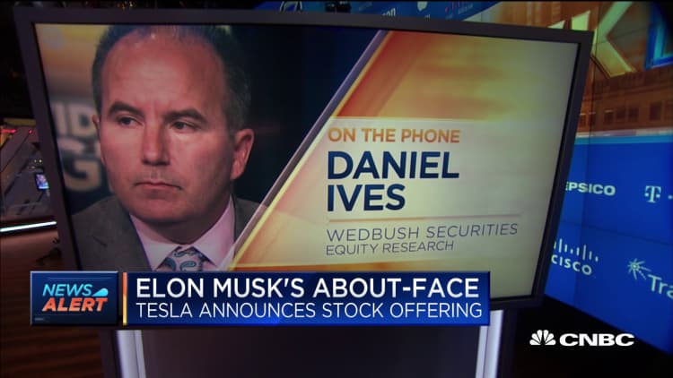 Tesla's new $2 billion offering eliminates cash worries, says bull Dan Ives