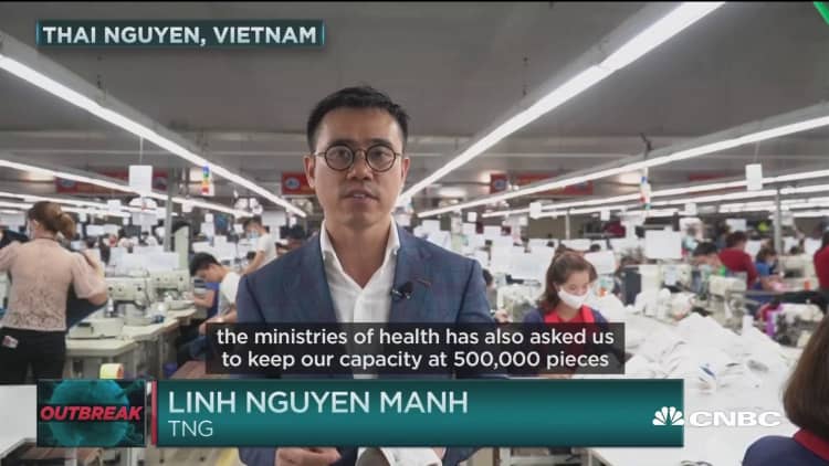 Vietnam garment factory switches focus to masks