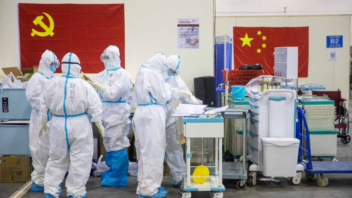 Wuhan hospital director dies from coronavirus, Moody's lowers China forecast