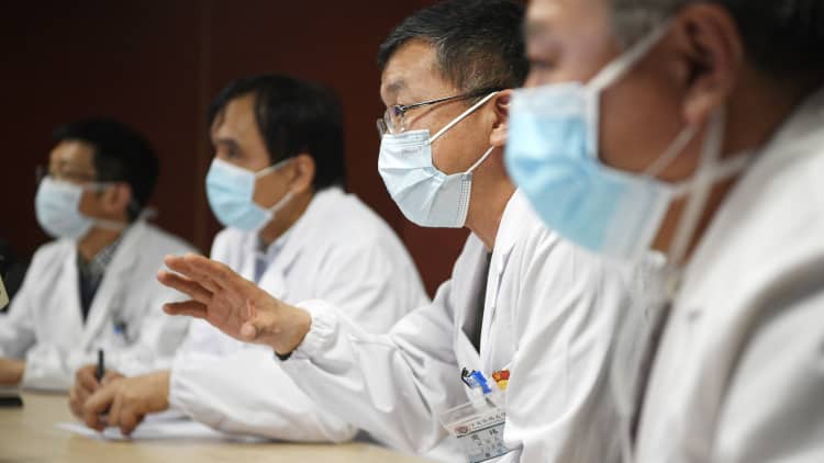 China reports nearly 1,900 new cases of coronavirus