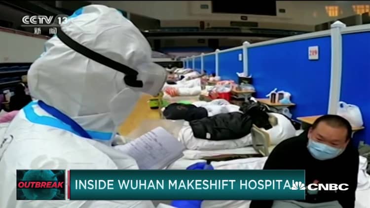 New video from China's makeshift hospitals; WSJ reporters kicked out of country