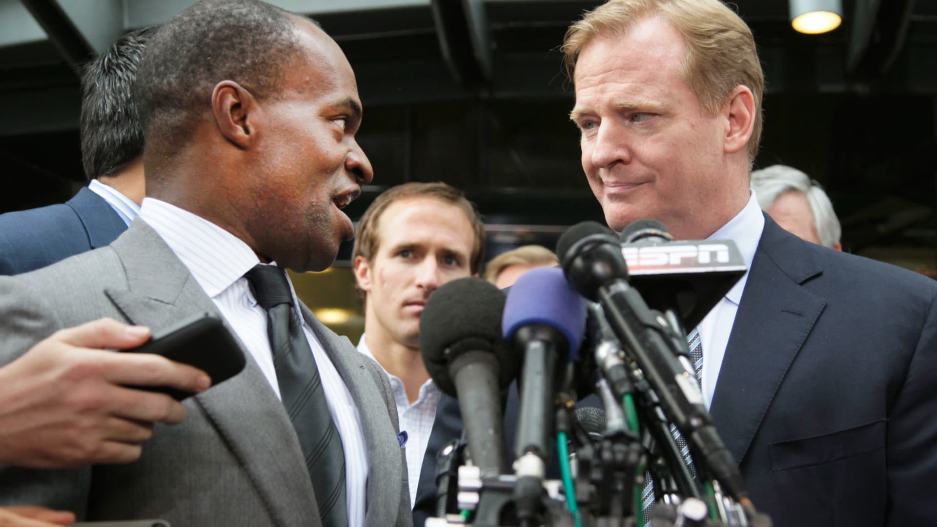In this July 25, 2011, file photo, NFLPA Executive Director DeMaurice Smith, left, and NFL football Commissioner Roger Goodell take part in a news conference at the NFL Players Association in Washington.