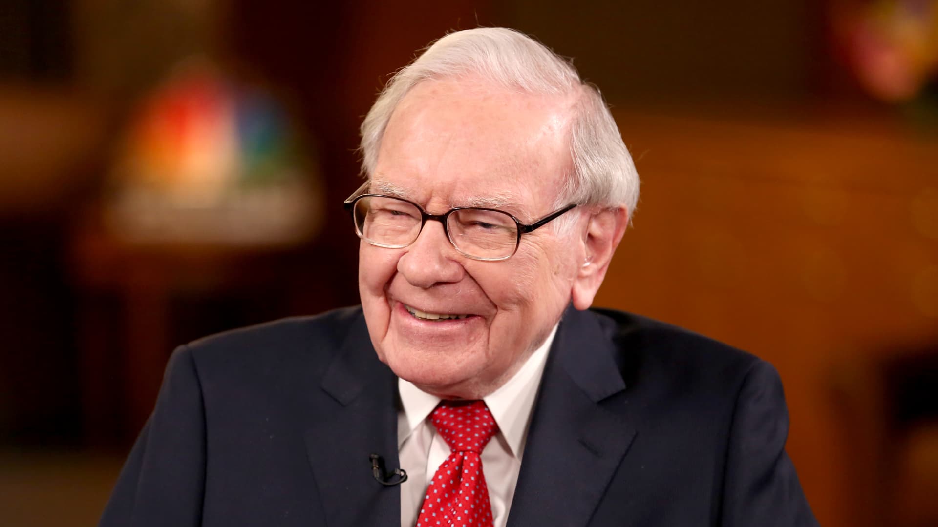 Berkshire Hathaway fourth-quarter operating earnings fall 8%, cash hoard swells to nearly $130 billion