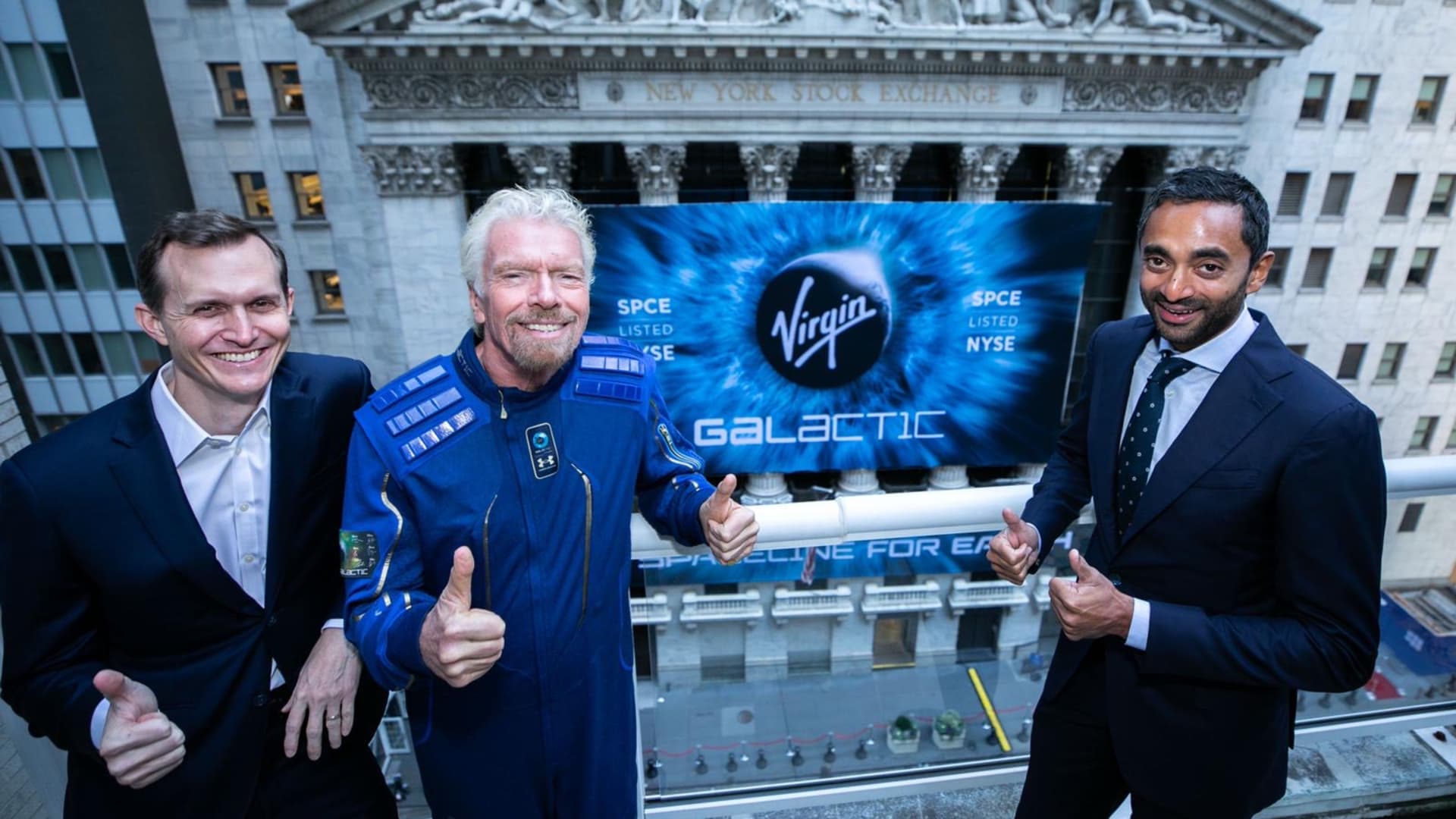 Virgin Galactic leaders in front of the New York Stock Exchange, from left: CEO George Whitesides, founder Richard Branson and Chairman Chamath Palihapitiya.