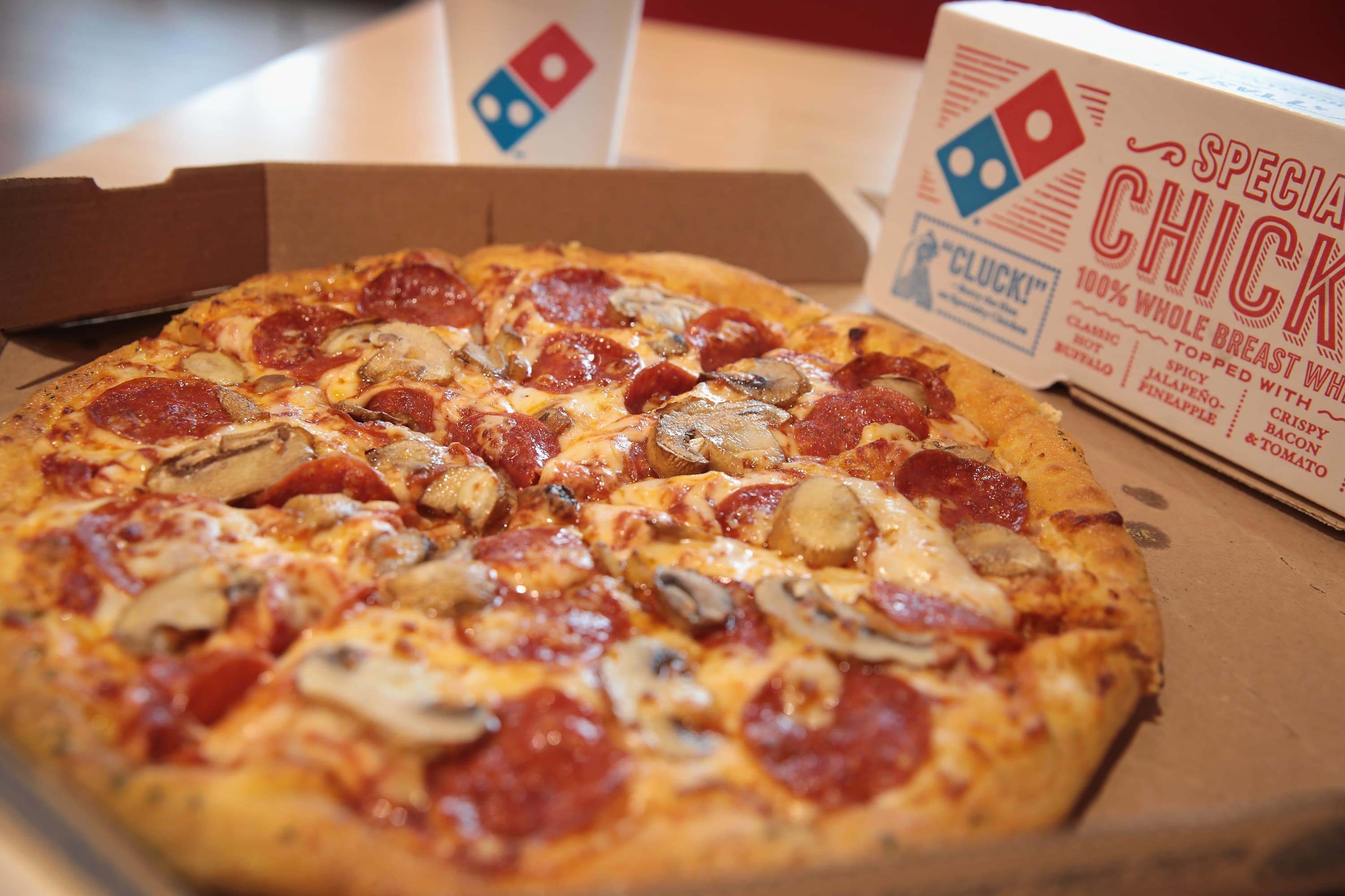 Fertile clothing neck Domino's stock yields higher returns than Google since IPOs