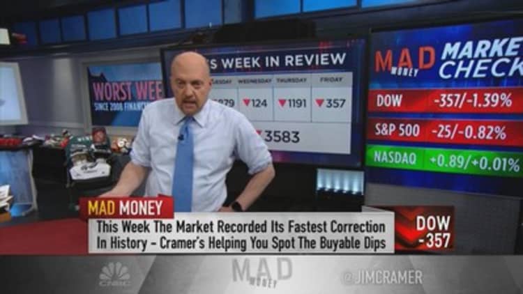 Buy stocks slowly — 'we're getting closer to a bottom,' Jim Cramer says
