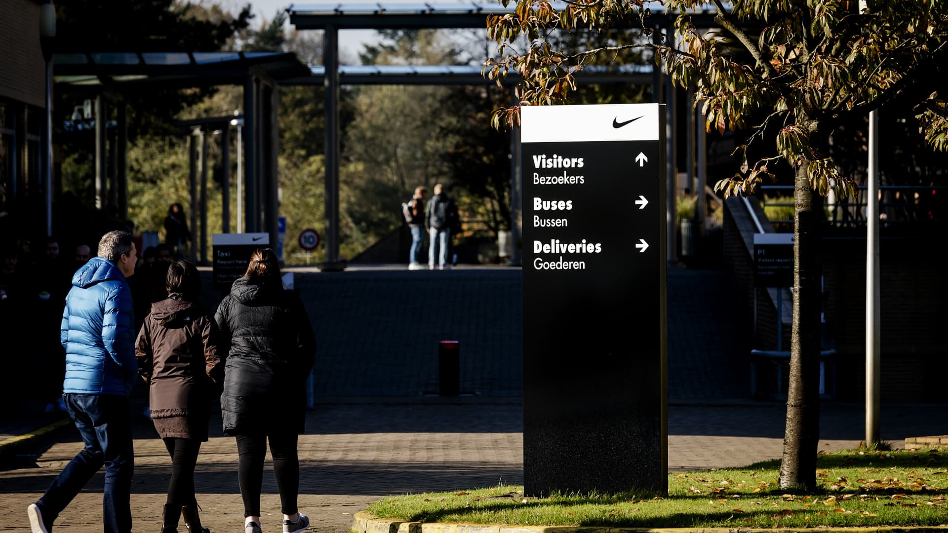 A picture taken on November 7, 2017 shows people arriving at the headquarters of Nike Europe in Hilversum.