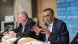 World Health Organization Director-General Tedros Adhanom Ghebreyesus R speaks at a daily briefing in Geneva, Switzerland.