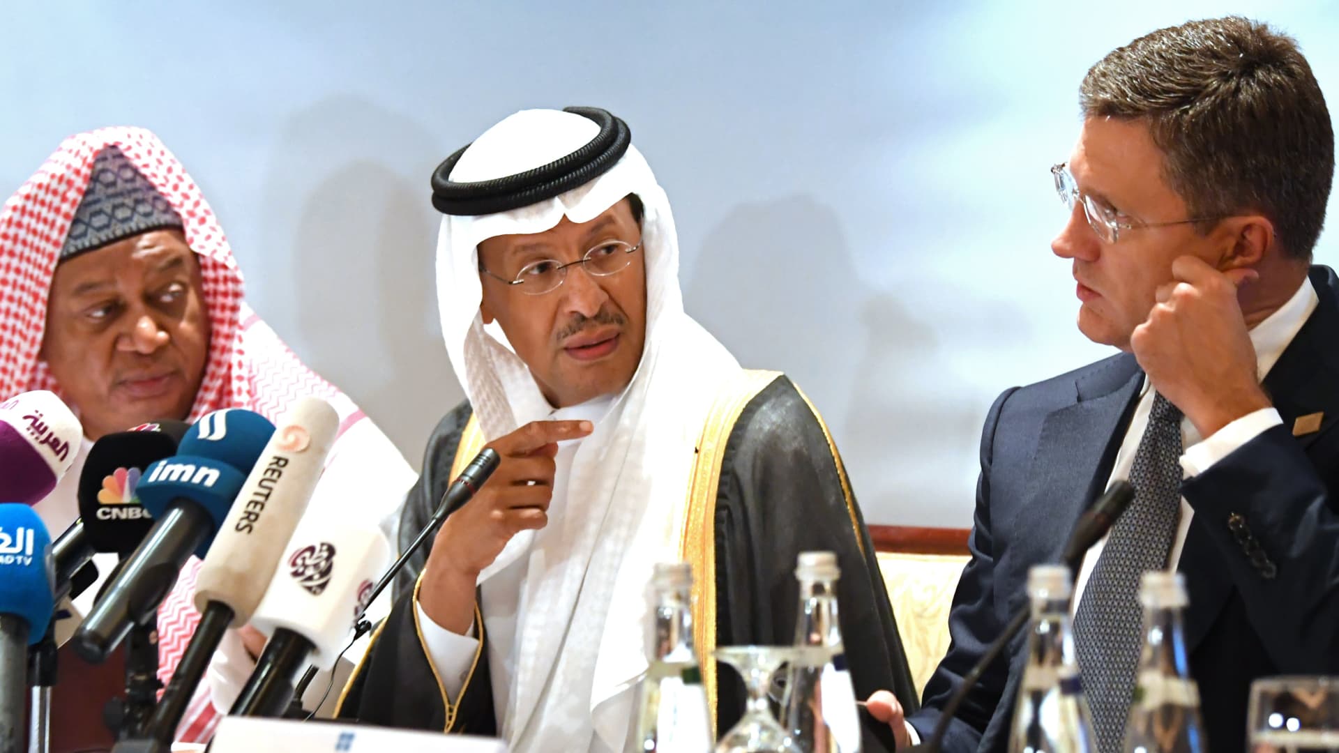 OPEC Secretary General Mohammed Sanusi Barkindo (L), Saudi Arabia's Energy Minister Prince Abdulaziz bin Salman (C) and Russian Energy Minister Alexander Novak (R) attend an Opec-JMMC meeting in the UAE capital Abu Dhabi on September 12, 2019.