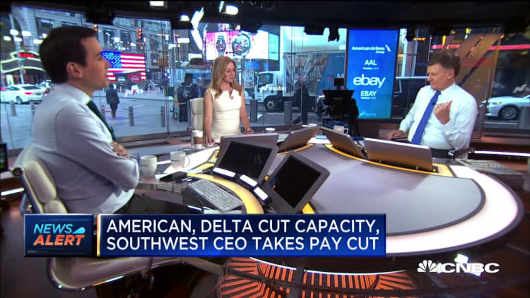 Delta cuts capacity, Southwest CEO takes pay cut as coronavirus drives down demand