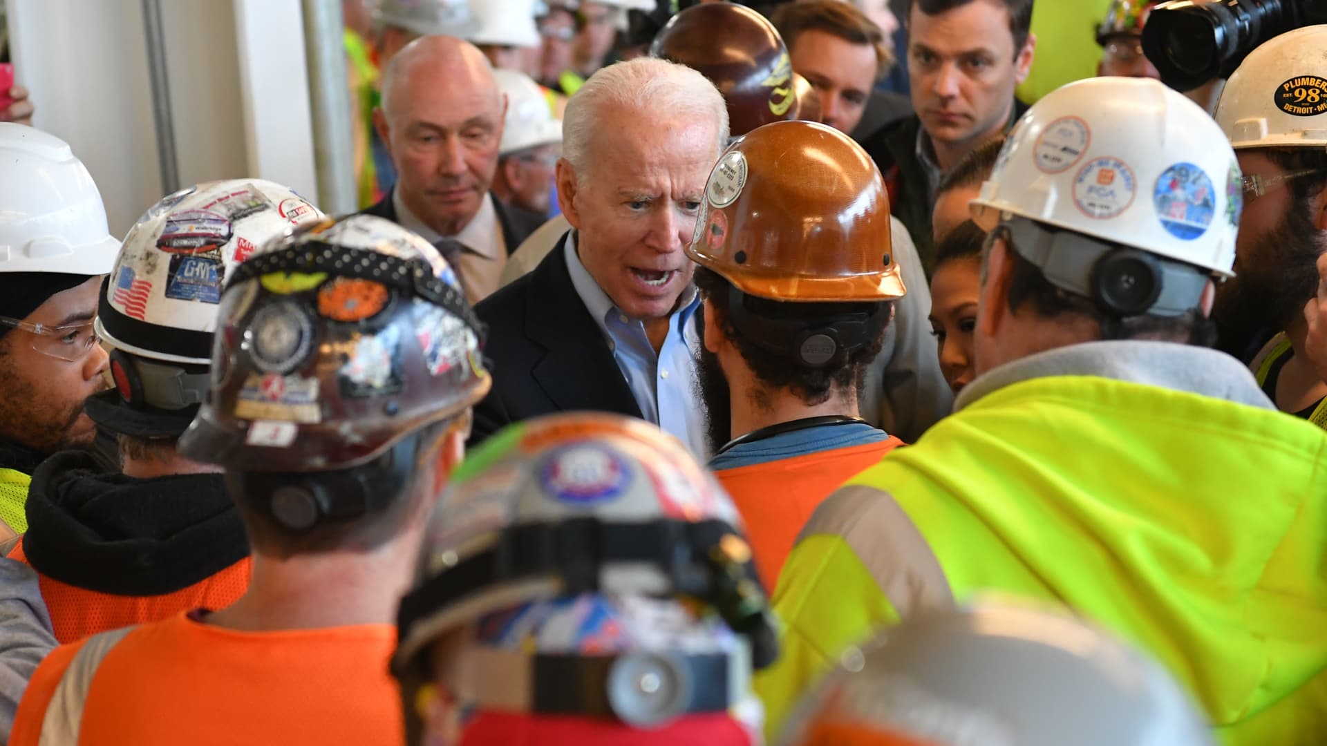 Then-Democratic presidential candidate Joe Biden meets workers as he tours the Fiat Chrysler plant in Detroit, Michigan on March 10, 2020.