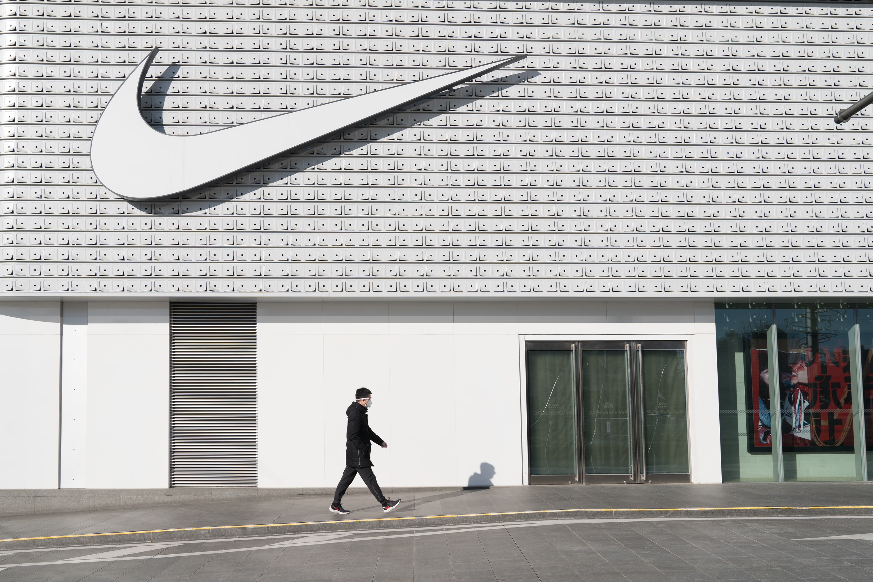Nike shares are down after the mixed earnings report, layoff news