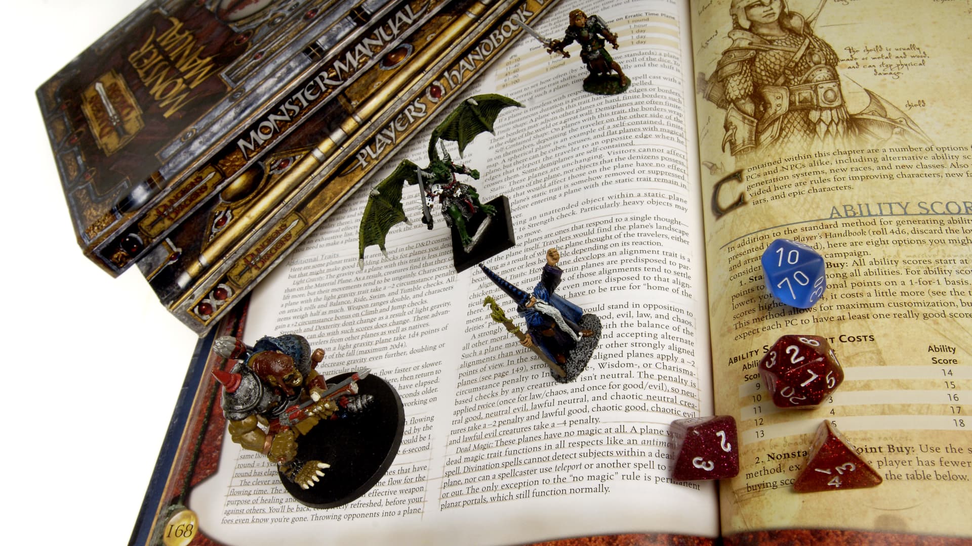 Dungeons & Dragons books, dice and mini-figurines.