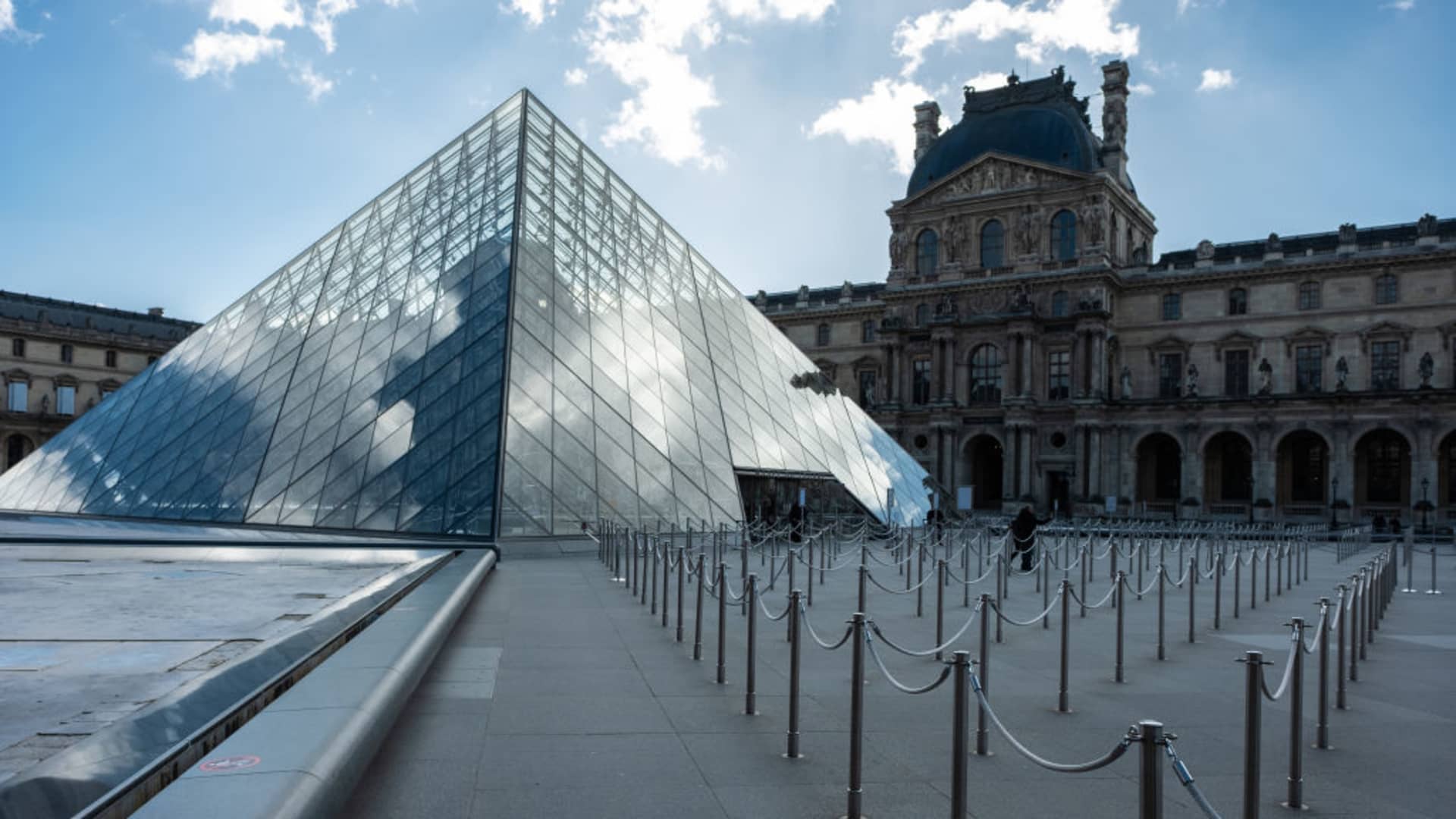 View of the Louvre museum quieter than ever in Paris, France, on March 13, 2020.