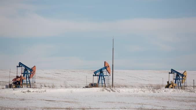 Oil pumping jacks, also known as "nodding donkeys", operate in an oilfield near Almetyevsk, Tatarstan, Russia, on Wednesday, March 11, 2020.
