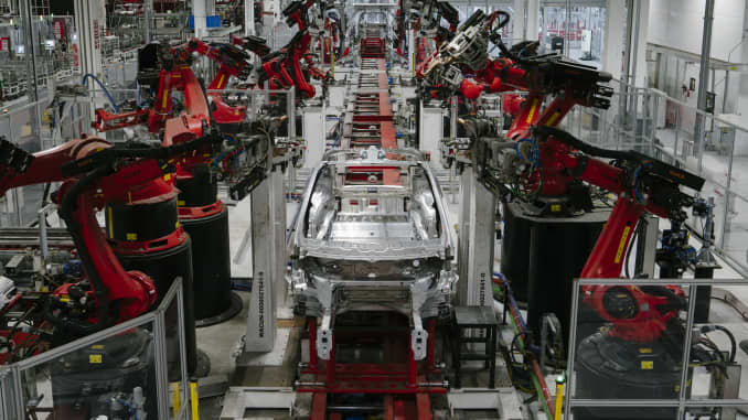Kuka robots work on Tesla Model X in the Tesla factory in Fremont, California.