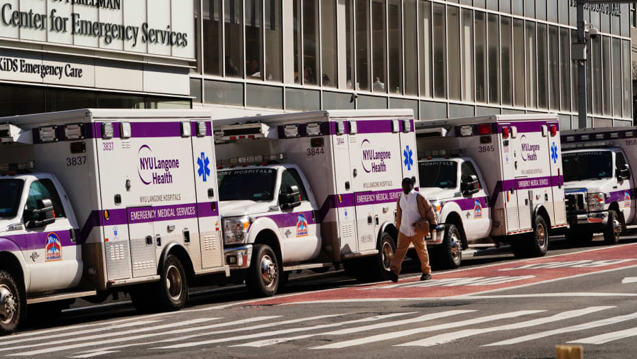 A view of parked ambulances in front of NYU Langone hospital amid the coronavirus (COVID-19) outbreak on March 26, 2020 in New York City.