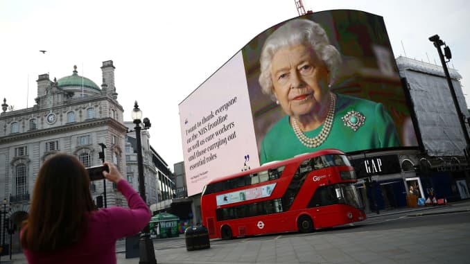 A message from Britain's Queen Elizabeth II is displayed on a screen in Piccadilly Circus, as the spread of the coronavirus disease (COVID-19) continues, London, Britain, April 8, 2020.