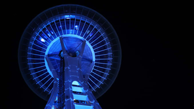 GP: Coronavirus : Across U.S., Stadiums, Landmarks Illuminated In Blue To Honor Essential Workers: Seattle WA