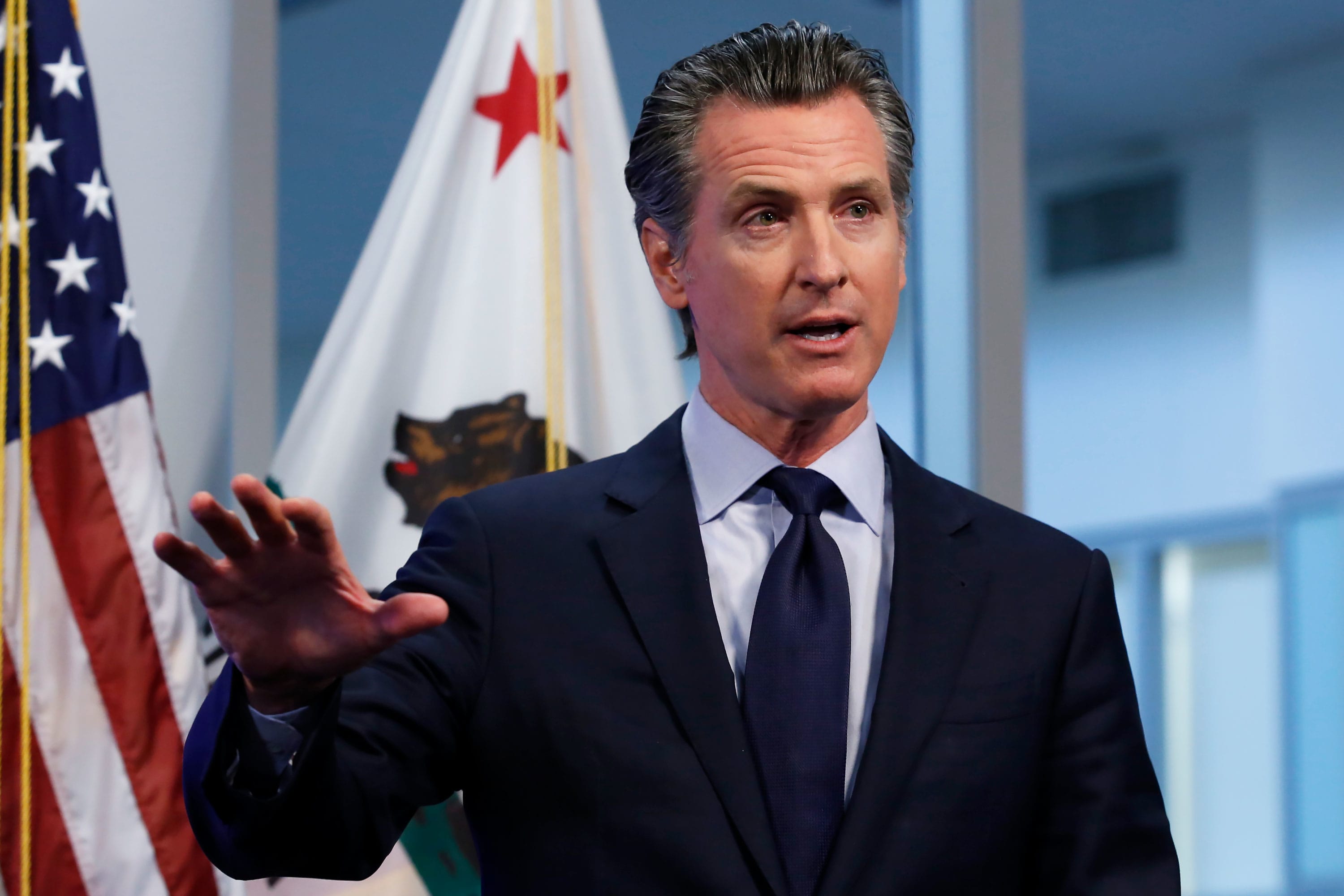 California Gov. Gavin Newsom says some businesses will reopen Friday, with conditions