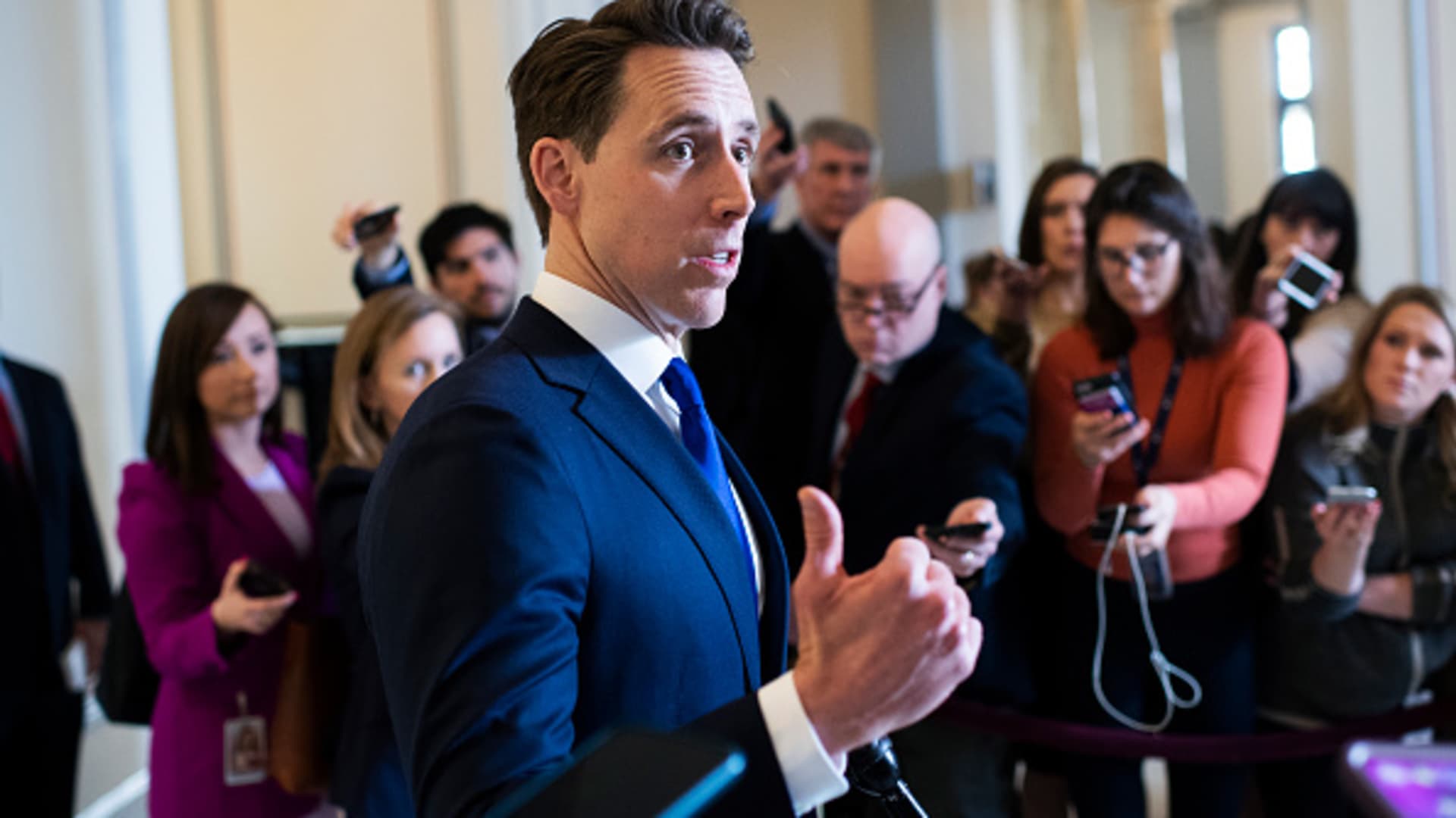 Sen. Josh Hawley, R-Mo., talks with reporters after the Senate Republican Policy luncheon in Russell Building on Tuesday, March 17, 2020.