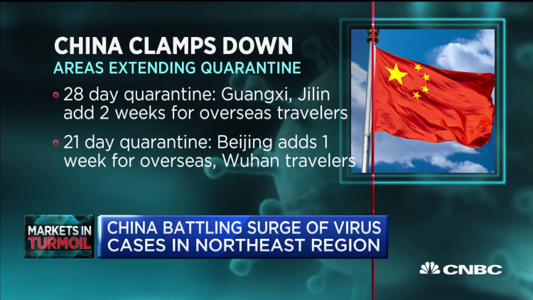 China battles surge of coronavirus cases in northeast region