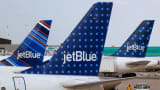 JetBlue Airways aircrafts are pictured at departure gates at John F. Kennedy International Airport in New York.