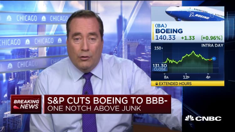 S&P cuts Boeing to BBB-, one notch above junk