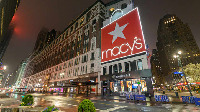Lights shine near a closed Macy's Herald Square as people remain at home to stop the spread of coronavirus on March 29, 2020 in New York City.