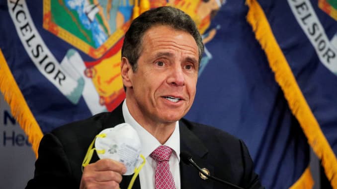 New York Governor Andrew Cuomo shows a face mask at a daily briefing at North Shore University Hospital, during the outbreak of the coronavirus disease (COVID-19) in Manhasset, New York, U.S., May 6, 2020.