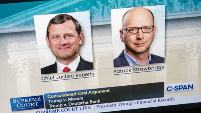 Chief Justice of the US John Roberts and Patrick Strawbridge, an attorney for US President Donald Trump, speak via an audio feed of Supreme Court oral arguments in Trump v. Mazars and Trump v. Deutche Bank AG, dealing with the subpoenas from the US Congre