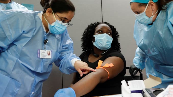 Shalonda Williams-Hampton, 32, has her blood taken by Northwell Health medical workers for the antibody tests that detect whether a person has developed immunity to the coronavirus disease (COVID-19) at the First Baptist Cathedral of Westbury in Westbury,