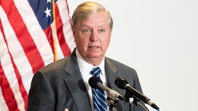 U.S. Senator Lindsey Graham (R-SC) speaks to the media on his way to the Republican caucus launch.