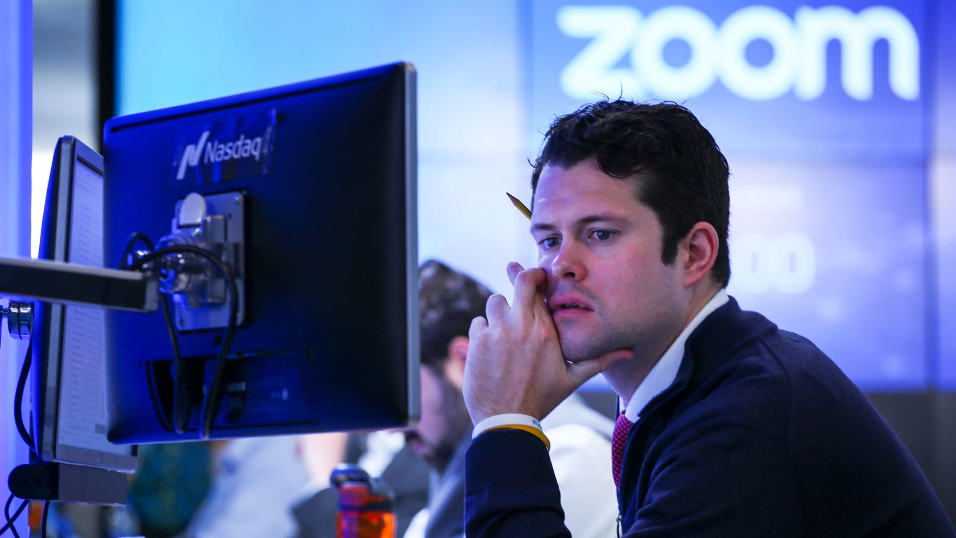 A trader working after the Nasdaq opening bell ceremony on April 18, 2019 in New York City.