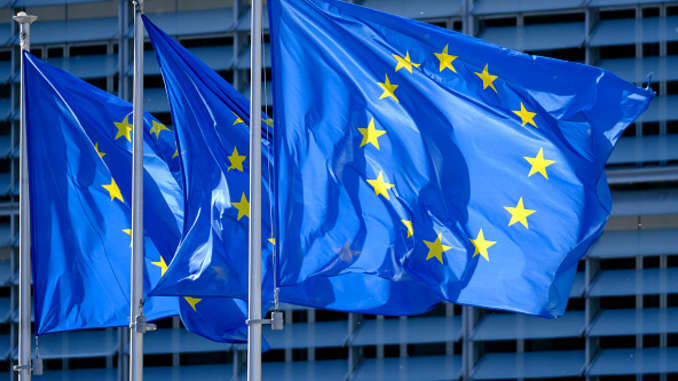The EU flags are seen in front of the Berlaymont, the EU Commission headquarter on May 19, 2020, in Brussels, Belgium.