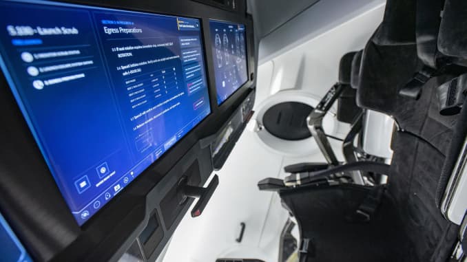 Inside the SpaceX Crew Dragon capsule, which has touch screen controls for the astronauts.