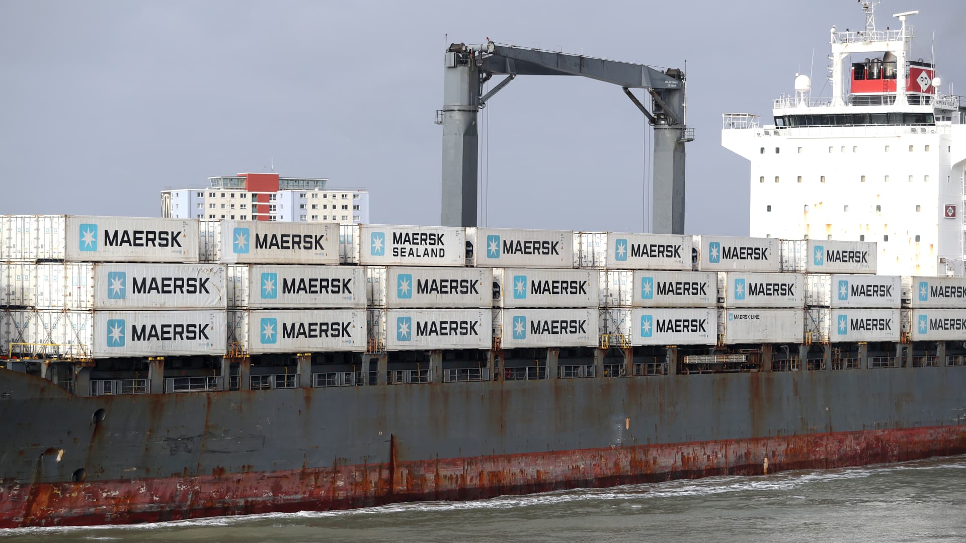 Worlds largest container shipping firm Maersk, a barometer for global trade, warns of 'dark clouds on the horizon'