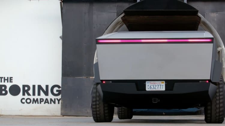 Jay Leno and Elon Musk Ride Tesla's Cybertruck into Boring Company Tunnel in Jay Leno's Garage