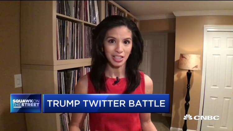 Trump battles with social media as Twitter hides new tweet