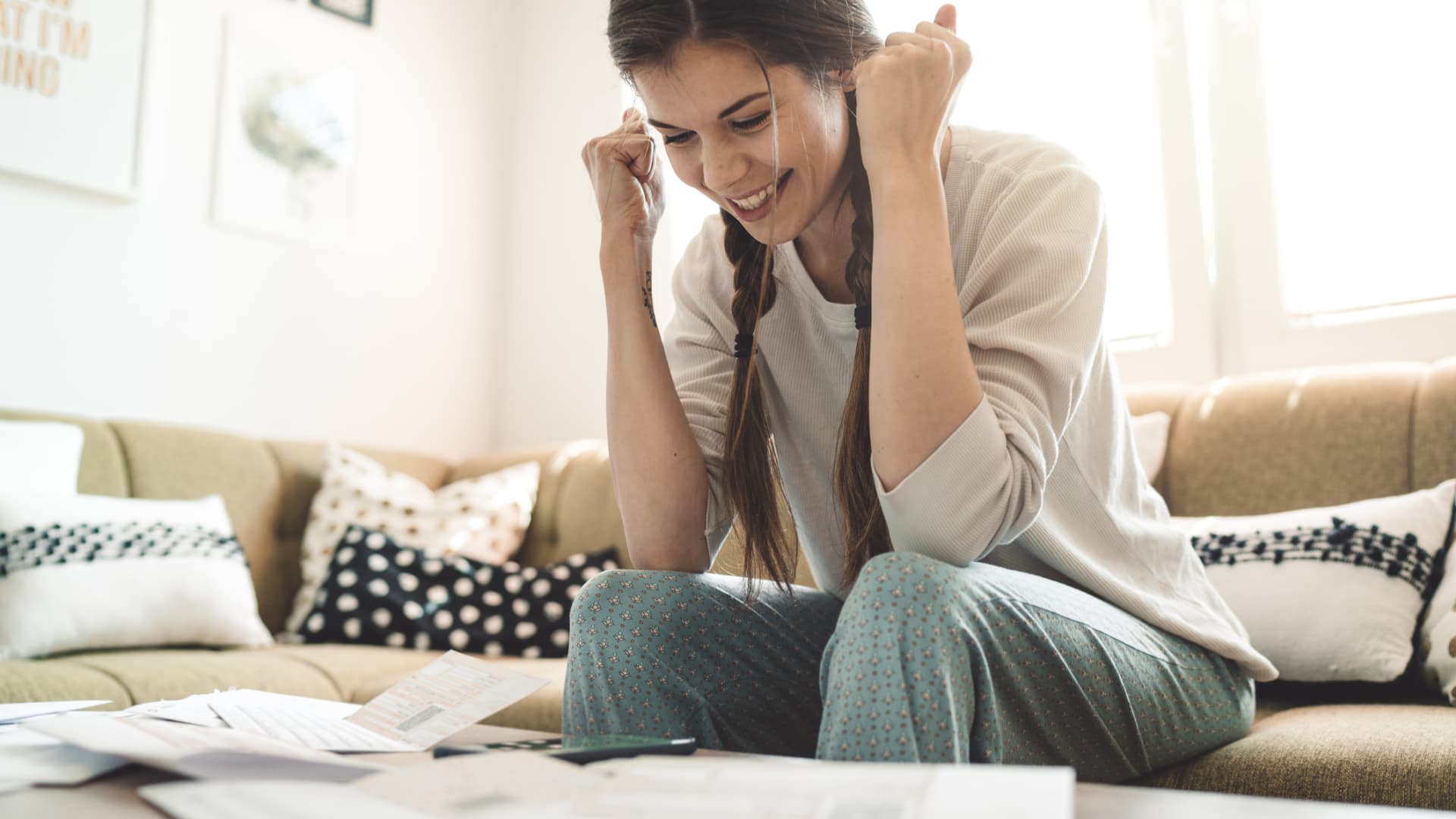 22% of millennials used their stimulus check to pay off credit card debt—here's how that could improve your credit score