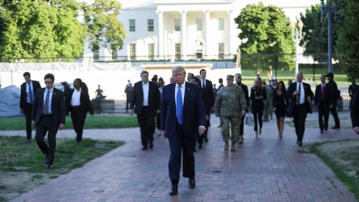 U.S. President Donald Trump walks through Lafayette Park to visit St. John's Episcopal Church across from the White House during ongoing protests over racial inequality in the wake of the death of George Floyd while in Minneapolis police custody, at the W