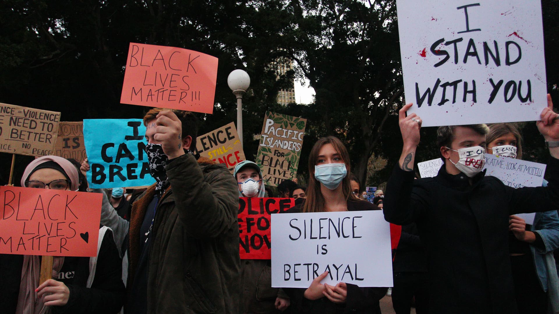 Protesters demonstrate in Hyde Park during a 'Black Lives Matter' rally on June 02, 2020 in Sydney, Australia. The event was organised to rally against aboriginal deaths in custody in Australia as well as in solidarity with protests across the United States following the killing of an unarmed black man George Floyd at the hands of a police officer in Minneapolis, Minnesota.