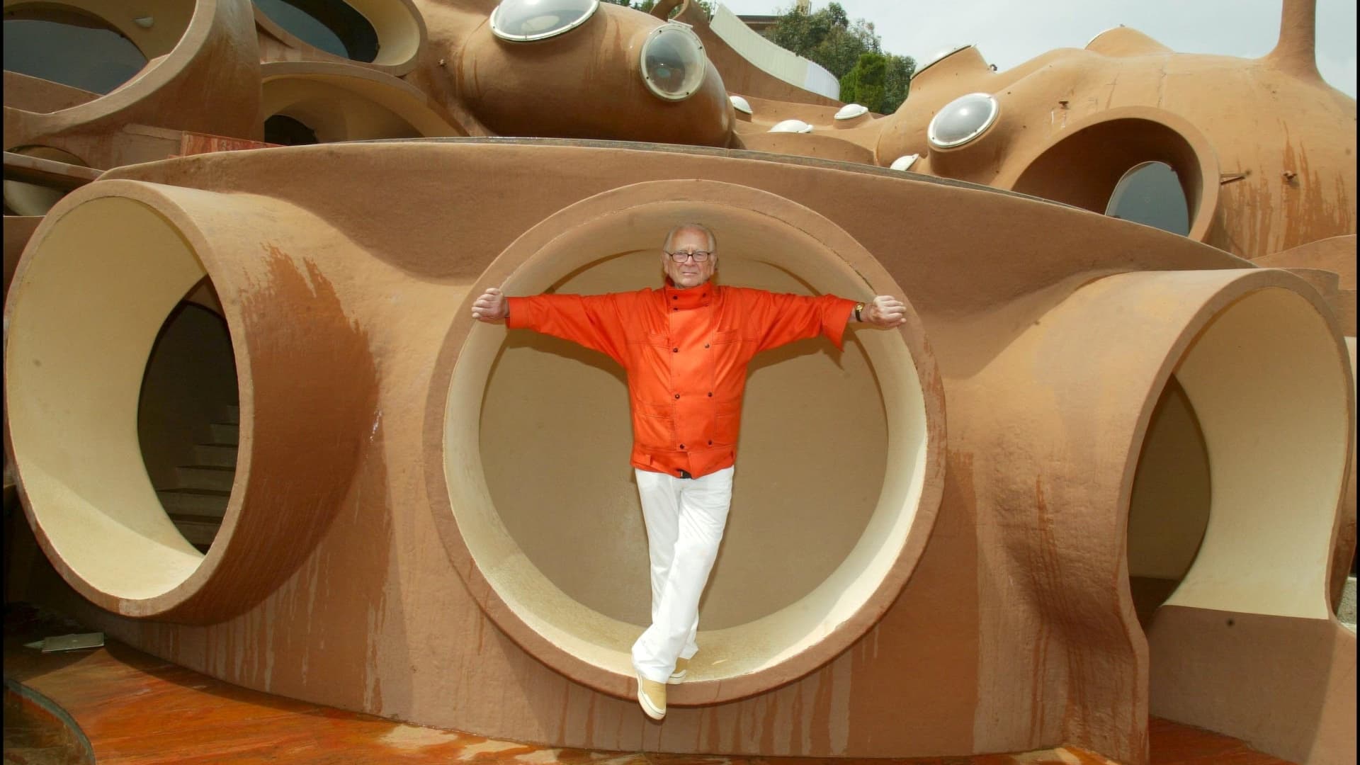At his Palais Bulles, Pierre Cardin celebrates his 80th birthday and 50 years of fashion designing in May 2003.