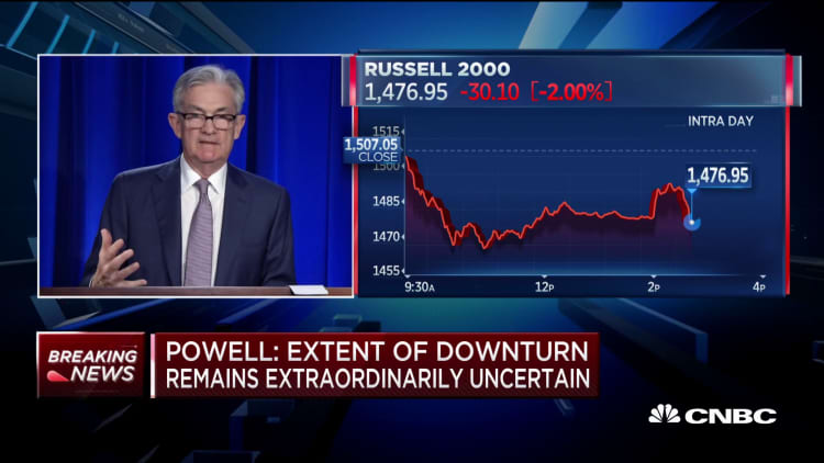 Path for the economy highly uncertain and continues to depend on pandemic: Fed's Powell
