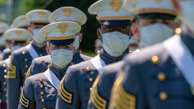 Cadets march into their commencement ceremony on June 13, 2020 in West Point, New York. The graduating cadets were sent home in March due to the Covid-19 pandemic, but have been ordered back to attend the commencement after the president announced he woul